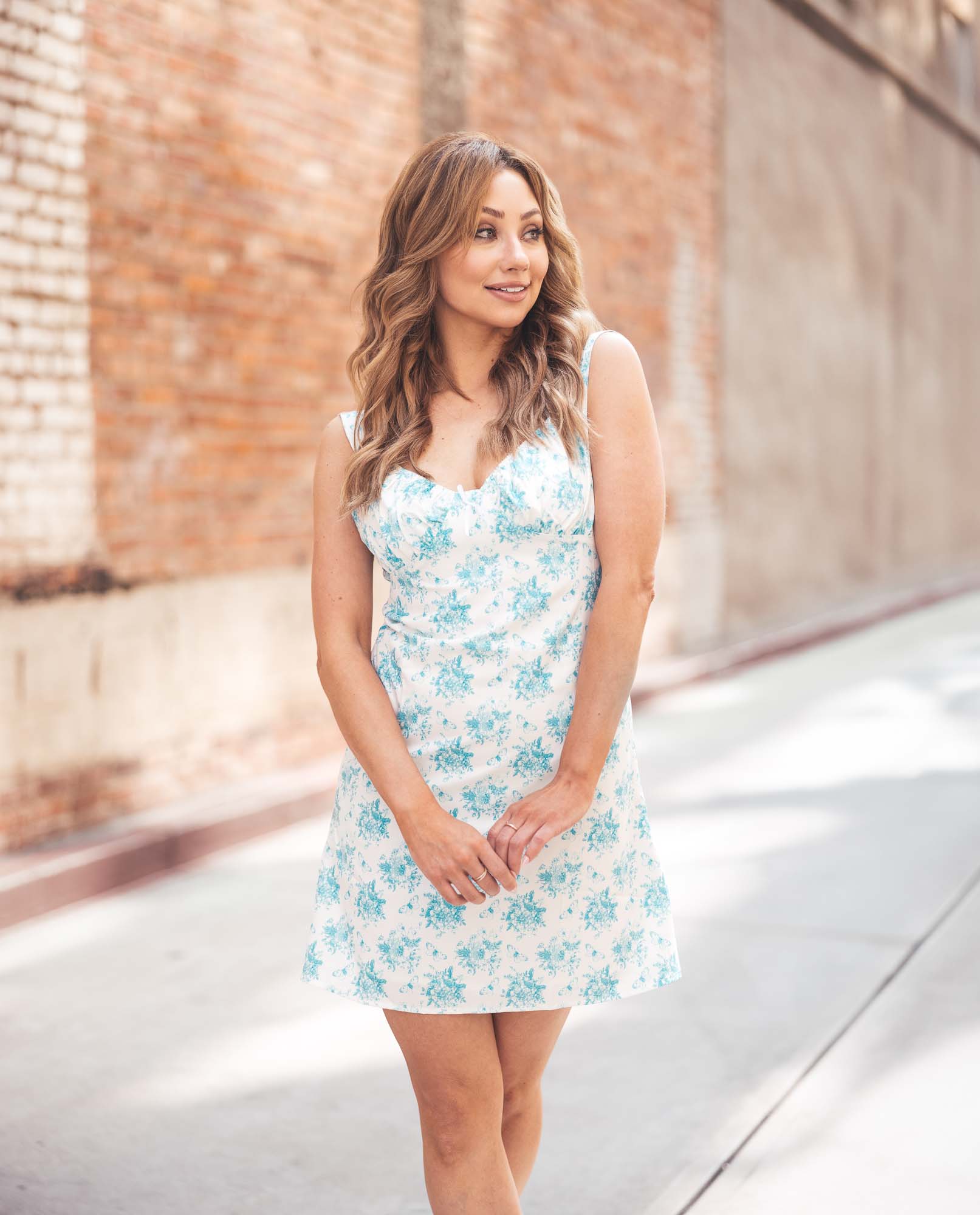Denver portrait photographers woman in summer dress looking cute